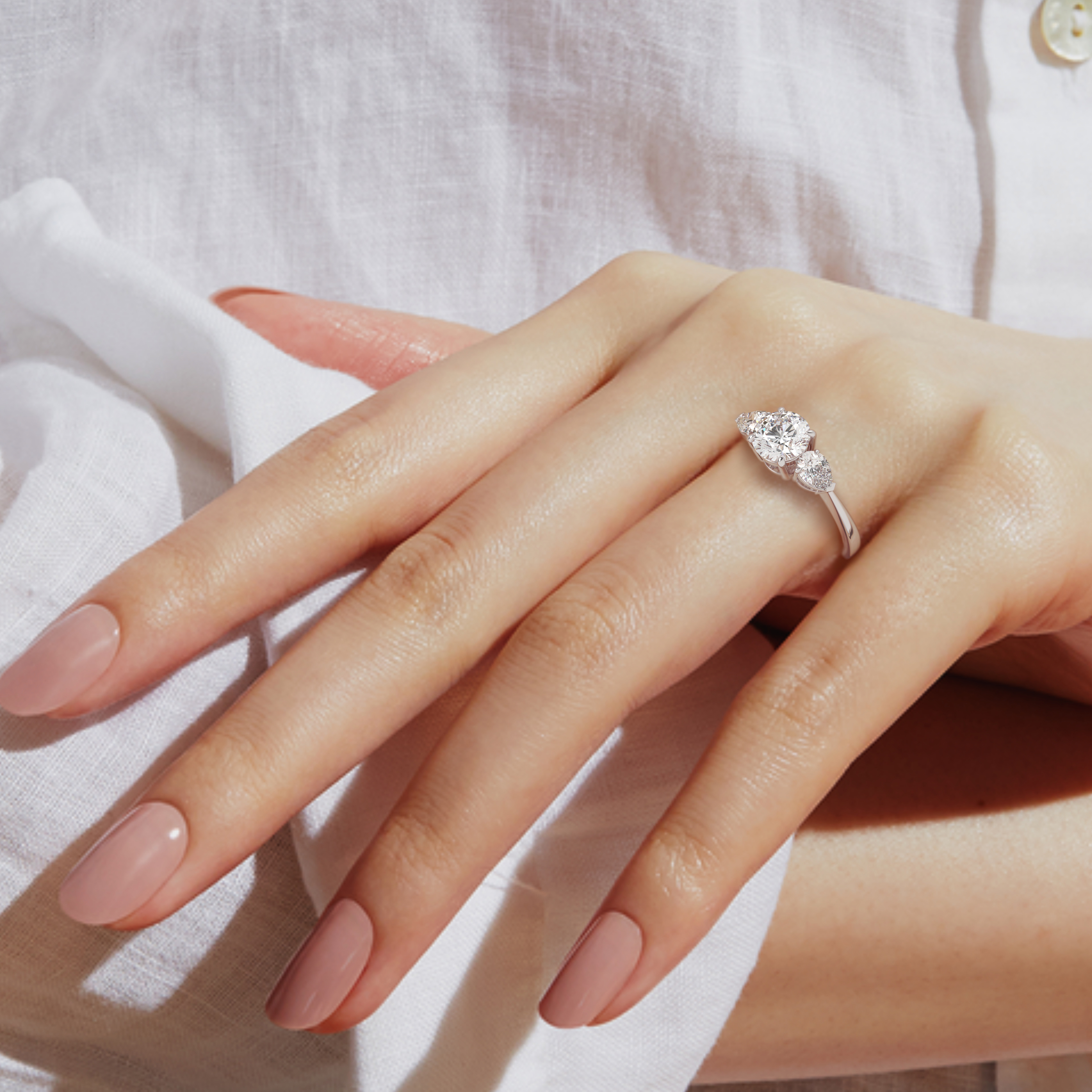 18k white gold  round & pear cut 3 stone diamond engagement  ring